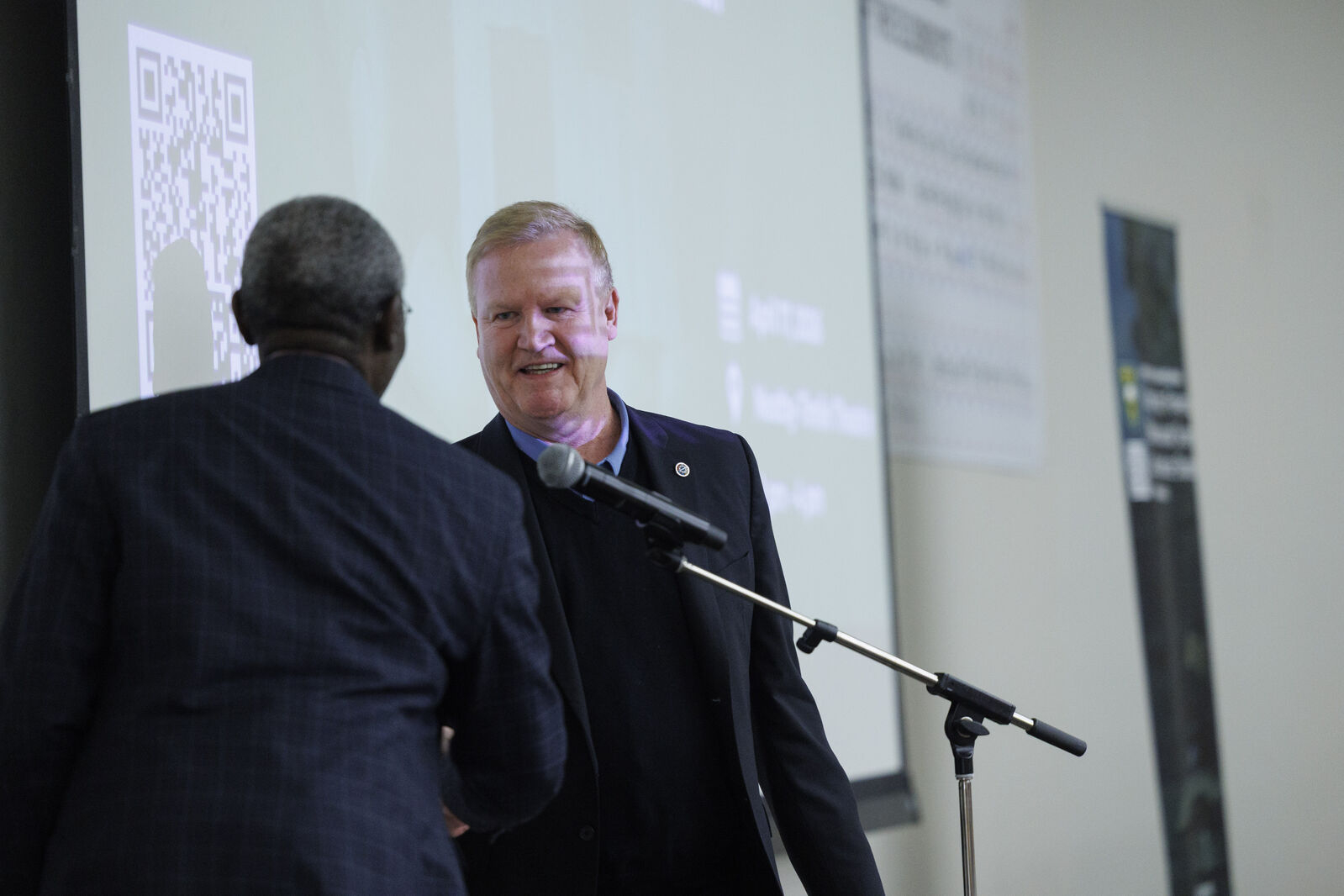 Dr. Mansfield Mela greeting Councillor Scott Ford